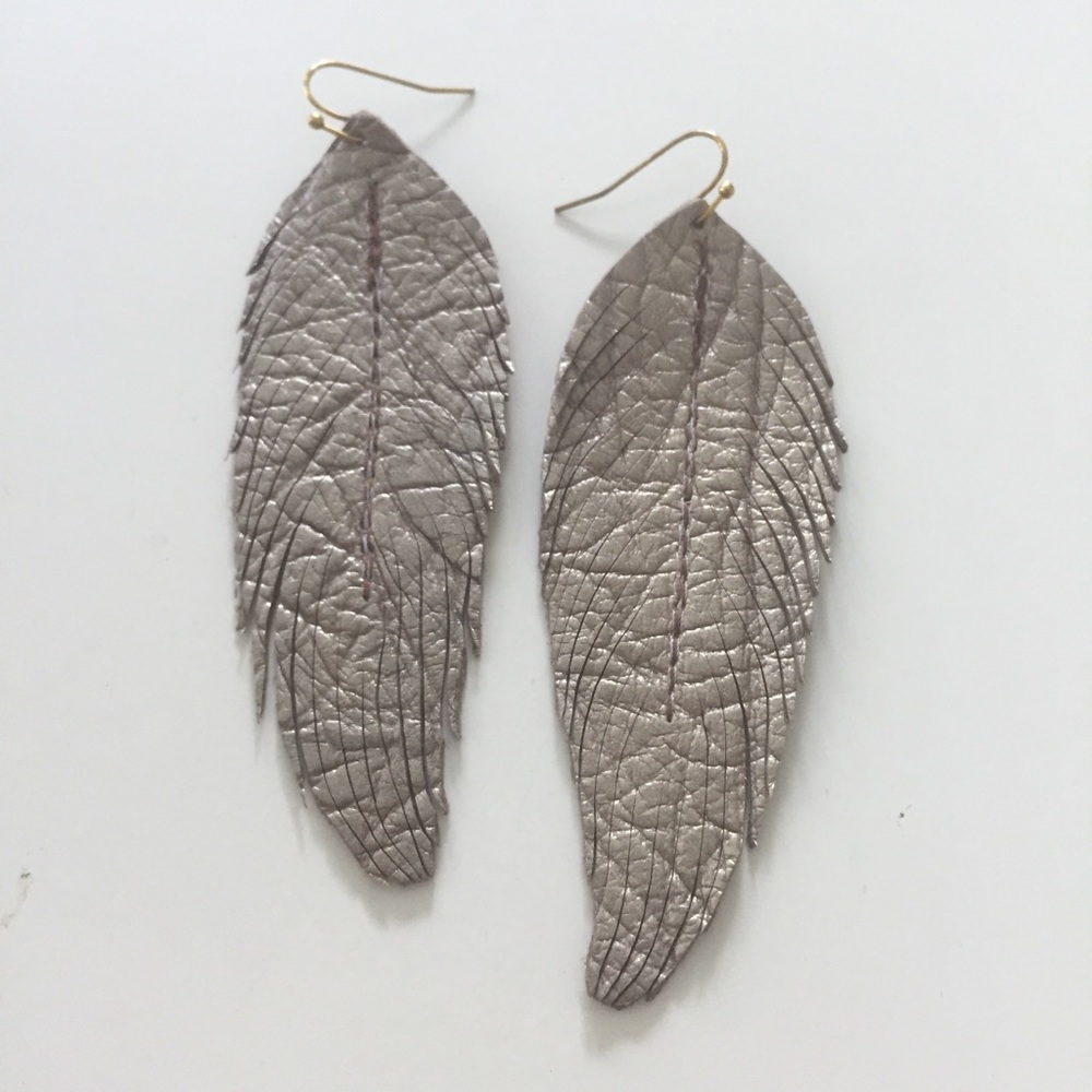 Genuine pearlized gray leather feather earrings